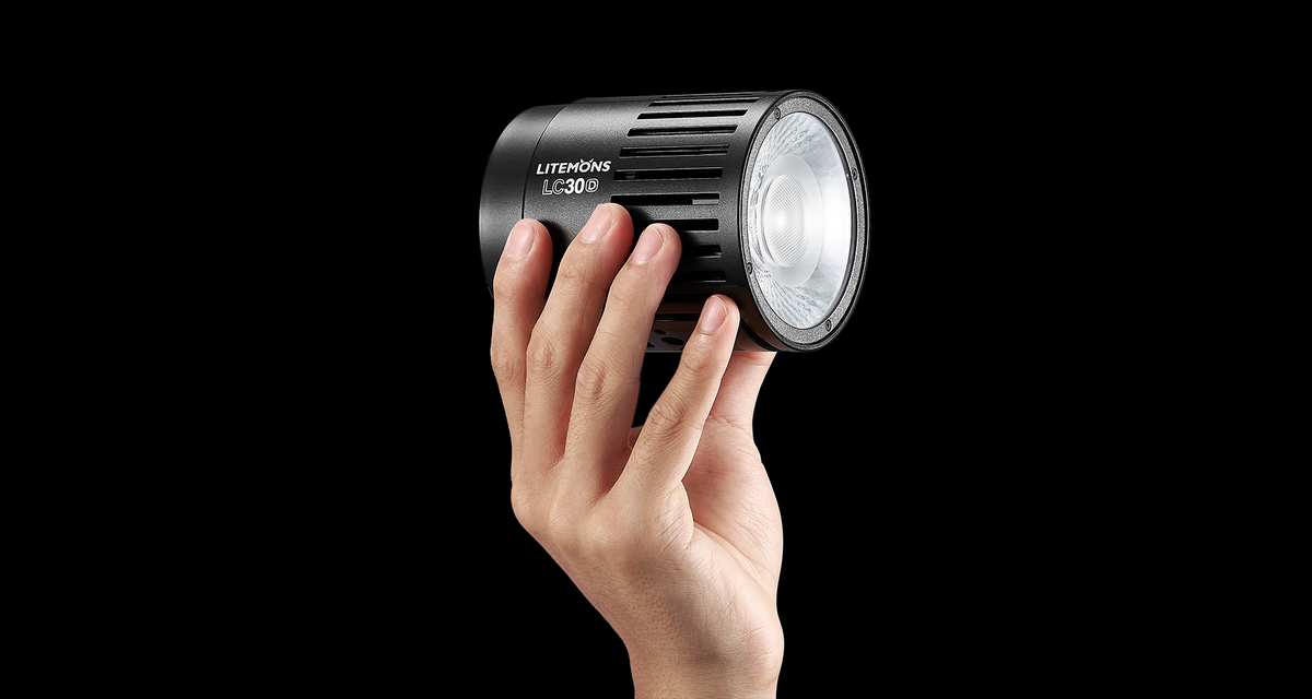 Godox Litemons LC30-series compact LED light held in one hand to show its small size