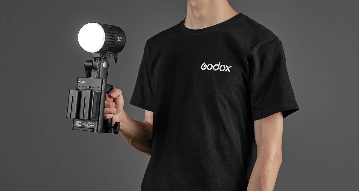 Godox Litemons LC30-series LED light on a handheld grip with battery box