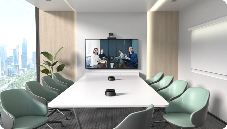Yealink UVC85 video conferencing camera installed above a display in a meeting room