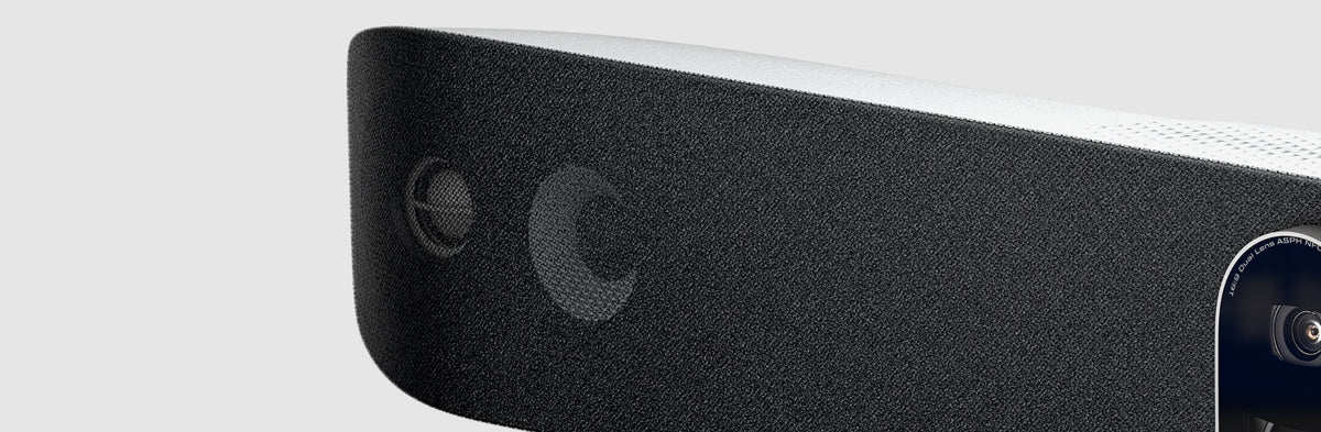 Close-up of the speaker grille and side of the Poly Studio V72 USB video bar