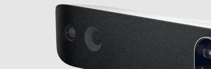 Close-up of the speaker grille and side of the Poly Studio V72 USB video bar