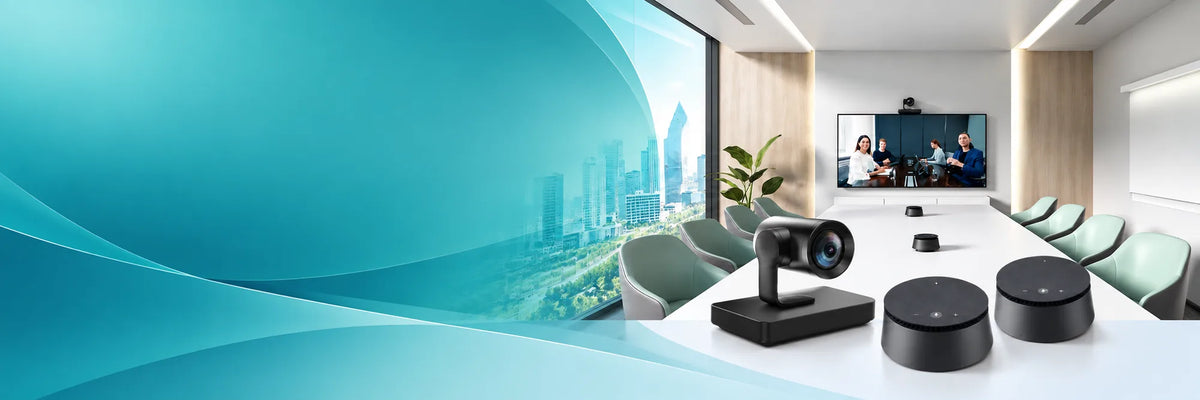 Yealink UVC85 4K PTZ video conferencing camera with CPE40 speakerphones on a boardroom table in a modern meeting room